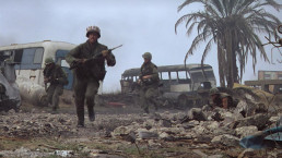 U.S. Marines advancing through a devastated area of Huế during the Battle of Huế in Full Metal Jacket (1987)