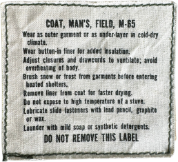 Original 1968 U.S. Army M-65 Field Jacket care and instruction label with cold-weather wear and maintenance instructions